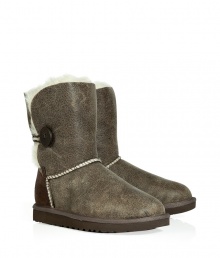 Stylishly distressed and undeniably cozy, these vintage-inspired shearling boots from UGG Australia lend comfort and style to your cold weather look - Round toe, rugged rubber sole, exposed seams, side button detail, contrasting back suede panel, cozy shearling lining, ankle-length , distressed leather - Pair with skinny jeans, an oversized cashmere sweater, and a down jacket or wool cape Stylishly distressed and undeniably cozy, these vintage-inspired shearling boots from UGG Australia lend comfort and style to your cold weather look - Round toe, rugged rubber sole, exposed seams, side button detail, contrasting back suede panel, cozy shearling lining, ankle-length , distressed leather - Pair with skinny jeans, an oversized cashmere sweater, and a down jacket or wool cape