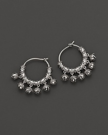 Inspired by Zen philosophy, these hoop earrings from Paul Morelli feature intricately detailed sterling silver meditation bells. Inspired by Zen philosophy, these hoop earrings from Paul Morelli feature intricately detailed sterling silver meditation bells.