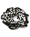 Accent a stylish bun or flowing ponytail with a playful printed scrunchie from MARC BY MARC JACOBS.