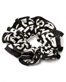Accent a stylish bun or flowing ponytail with a playful printed scrunchie from MARC BY MARC JACOBS. Accent a stylish bun or flowing ponytail with a playful printed scrunchie from MARC BY MARC JACOBS.
