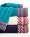 Rainbow room. An assortment of bright hues form a chic zigzag pattern along the hem of this fun Rainbow Chevron hand towel from Bianca. Choose from three modern colors.