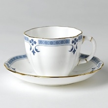Though Grenville's geometric shapes and studs, set in a narrow border, lend the pattern a modern feel, the stylish leaf and flower elements closely follow classic Derby tradition. Though Grenville's geometric shapes and studs, set in a narrow border, lend the pattern a modern feel, the stylish leaf and flower elements closely follow classic Derby tradition.