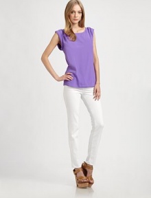 Gorgeous silk charmeuese, elegantly rolled at the shoulders for a look that's effortlessly chic.BoatneckExtended rolled shouldersFlat frontPullover styleSilkDry cleanImportedModel shown is 5'9 (175cm) wearing US size Small. Gorgeous silk charmeuese, elegantly rolled at the shoulders for a look that's effortlessly chic.BoatneckExtended rolled shouldersFlat frontPullover styleSilkDry cleanImportedModel shown is 5'9 (175cm) wearing US size Small.