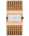 A shining example of detailed elegance from DKNY. Watch crafted of rose-gold ion-plated stainless steel bracelet embellished with rose-gold tone crystal accents and rectangular rose-gold ion-plated stainless steel case. White dial features rose-gold tone two hands, stick indices at six, nine and twelve o'clock and logo at three o'clock. Quartz movement. Water resistant to 30 meters. Two-year warranty.