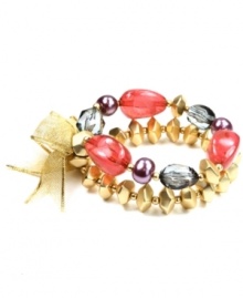 Unique and unexpected. A chic combination of gold, red, purple and grey beads yields an eclectic effect for Jones New York's double-row stretch bracelet. Crafted in gold tone mixed metal, the stretch design makes it comfortable and easy to wear. Item comes packaged in a signature gift box. Approximate diameter: 2-1/2 inches. Unique and unexpected. A chic combination of gold, red, purple and grey beads yields an eclectic effect for Jones New York's double-row stretch bracelet. Crafted in gold tone mixed metal, the stretch design makes it comfortable and easy to wear. Item comes packaged in a signature gift box. Approximate diameter: 2-1/2 inches.