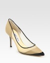 Mesh-covered leather in a colorblock design with contrasting patent leather trim and a timeless point toe. Self-covered heel, 3½ (90mm)Mesh-covered leather and patent leather upperLeather solePadded insoleMade in ItalyOUR FIT MODEL RECOMMENDS ordering true size. 