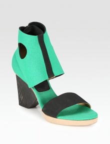 Ultra-comfortable silhouette with contrasting trim and a substantial wooden heel. Wooden heel, 3 (75mm)Covered platform, ½ (15mm)Compares to a 2½ heel (65mm)Elastic and neoprene upperNeoprene liningLeather solePadded insoleMade in ItalyOUR FIT MODEL RECOMMENDS ordering one half size up as this style runs small. Ultra-comfortable silhouette with contrasting trim and a substantial wooden heel. Wooden heel, 3 (75mm)Covered platform, ½ (15mm)Compares to a 2½ heel (65mm)Elastic and neoprene upperNeoprene liningLeather solePadded insoleMade in ItalyOUR FIT MODEL RECOMMENDS ordering one half size up as this style runs small.