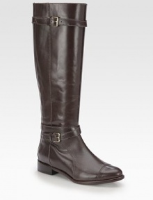 Timeless smooth leather design with wrap-around buckle straps and a convenient back zip. Stacked heel, 1¼ (30mm)Shaft, 16Leg circumference, 13Leather upperBack zip and adjustable buckle strapsLeather lining and solePadded insoleImported Timeless smooth leather design with wrap-around buckle straps and a convenient back zip. Stacked heel, 1¼ (30mm)Shaft, 16Leg circumference, 13Leather upperBack zip and adjustable buckle strapsLeather lining and solePadded insoleImported