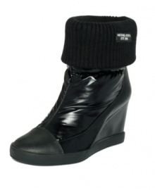 Paired with leggings and an oversized poncho sweater, the Winter wedge booties by MICHAEL Michael Kors make snowy weather look chic. Paired with leggings and an oversized poncho sweater, the Winter wedge booties by MICHAEL Michael Kors make snowy weather look chic.