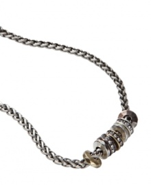 Fossil hits a vintage note with this chain necklace. Multitone mixed metal crystal-accented rondelle beads hang like miniature rings from a silvertone wheat chain. Approximate length: 16 inches. Fossil hits a vintage note with this chain necklace. Multitone mixed metal crystal-accented rondelle beads hang like miniature rings from a silvertone wheat chain. Approximate length: 16 inches.
