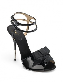 THE LOOKLace-up satin bow detailDouble ankle straps with buckle closuresMetal-tipped heelTHE FITHeel 4½ (115mm)THE MATERIALPatent leather & satin upperMetal heelLeather lining and soleORIGINMade in Italy THE LOOKLace-up satin bow detailDouble ankle straps with buckle closuresMetal-tipped heelTHE FITHeel 4½ (115mm)THE MATERIALPatent leather & satin upperMetal heelLeather lining and soleORIGINMade in Italy