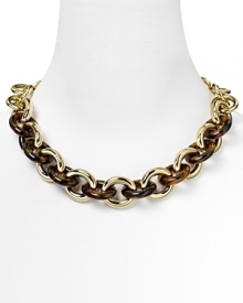 Gleaming gold meets the natural warmth of tortoise shell in this chic twist from MICHAEL Michael Kors. Gleaming gold meets the natural warmth of tortoise shell in this chic twist from MICHAEL Michael Kors.