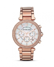 A gleaming mother of pearl dial is framed by a Swarovski crystal encrusted bezel in this glamorous timepiece from MICHAEL Michael Kors. A gleaming mother of pearl dial is framed by a Swarovski crystal encrusted bezel in this glamorous timepiece from MICHAEL Michael Kors.