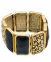 Embrace your serpentine side. This python printed style by T Tahari puts the chic in cuff bracelet! Crafted in antique gold tone mixed metal with light Colorado crystal inlay resin accents. Bracelet stretches to fit wrist. Base metal is nickel free for sensitive skin. Approximate diameter: 2-1/4 inches.