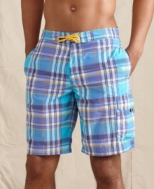 Plaid perfection. Ride a wave of preppy style at the beach this summer with these swim trunks from Tommy Hilfiger. Plaid perfection. Ride a wave of preppy style at the beach this summer with these swim trunks from Tommy Hilfiger.