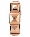 Go undercover with this pyramid-stud watch from Vince Camuto. Features a bangle bracelet-inspired design with a covered dial.