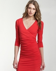 Allover ruching ensures the most flattering fit for this body-con Velvet by Graham & Spencer dress, featuring a crossover neckline and three-quarter sleeves. Allover ruching ensures the most flattering fit for this body-con Velvet by Graham & Spencer dress, featuring a crossover neckline and three-quarter sleeves.