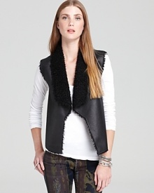 Fashioned in faux suede with a faux shearling lining, this Velvet by Graham & Spencer is a cozy yet stylish layer over rustic button-ups and fancy blouses alike. Fashioned in faux suede with a faux shearling lining, this Velvet by Graham & Spencer is a cozy yet stylish layer over rustic button-ups and fancy blouses alike.