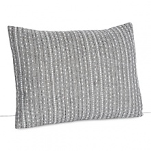 Embroidered lines in shades of white and grey stripe this soft chambray pillow. Embroidered lines in shades of white and grey stripe this soft chambray pillow.