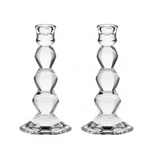 Inspired by modern architectural elements and the faceted gems of the designer's jewelry, Vera Wang's Orient, these luminous Vera Wang candlesticks lend timeless grandeur to your table. Inspired by modern architectural elements and the faceted gems of the designer's jewelry, Vera Wang's Orient, these luminous Vera Wang candlesticks lend timeless grandeur to your table.