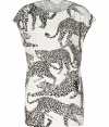 Take a walk on the wild side with Salonis eye-catching leopard printed silk top, the perfectly fashion-forward accent to polished business to cocktails looks - Rounded neckline, dolman cap sleeves, pull-over style - Easy feminine fit - Tuck into pencil skirts and finish with platform peep-toes, or try with leather leggings and statement carryall totes