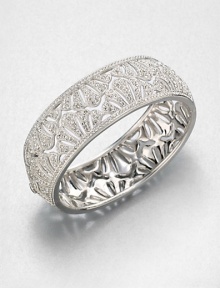 Shell Pattern Sparkle BangleThe lacy shell pattern of this shimmering pavé design is as feminine as it is fabulous.CrystalRhodium platingDiameter, about 2.25Hinged with tongue-and-groove claspImported Shell Pattern Sparkle BangleThe lacy shell pattern of this shimmering pavé design is as feminine as it is fabulous.CrystalRhodium platingDiameter, about 2.25Hinged with tongue-and-groove claspImported
