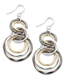 Good style comes in threes. Alfani's chic circular earrings feature an interlocking design in silver, gold, and hematite tone mixed metal. Approximate drop: 2-3/4 inches. Good style comes in threes. Alfani's chic circular earrings feature an interlocking design in silver, gold, and hematite tone mixed metal. Approximate drop: 2-3/4 inches.