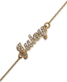 The write stuff. Juicy Couture plays the name game in winning fashion with this bracelet crafted from gold tone brass with cubic zirconia accents (1/2 ct. t.w.). Approximate length: 6-1/2 inches + 1/2-inch extender. The write stuff. Juicy Couture plays the name game in winning fashion with this bracelet crafted from gold tone brass with cubic zirconia accents (1/2 ct. t.w.). Approximate length: 6-1/2 inches + 1/2-inch extender.