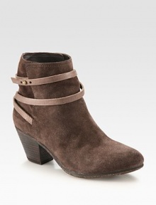 Adjustable leather strap wraps around this butter-soft suede ankle boot while a stacked heel adds a touch of height. Stacked heel, 2½ (65mm)Suede and leather upperLeather lining and solePadded insoleImported