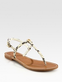 Skinny watersnake straps surround the foot and conclude with an adjustable slingback, thong front and goldtone designer emblem. Watersnake upperLeather liningRubber soleImported Skinny watersnake straps surround the foot and conclude with an adjustable slingback, thong front and goldtone designer emblem. Watersnake upperLeather liningRubber soleImported