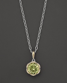 Diamonds, set in sterling silver and 18K yellow gold, frame a faceted round of lemon quartz. By Tacori. Diamonds, set in sterling silver and 18K yellow gold, frame a faceted round of lemon quartz. By Tacori.