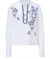 Stylish white top with blue embroidery from Ermanno Scervino - A fun quirky-cool print enlivens this flattering blouse - Small stand collar, button front placket with ruffle detail, front embroidery, long two-button cuffs - Wear with flared jeans, a military-style jacket, and stacked heel boots