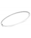 Shimmering and stunning. This stackable bangle bracelet, crafted from 14k white gold, sparkles with diamond accents. Approximate length: 7 inches. Approximate diameter: 2-1/3 inch x 2-1/8 inch.