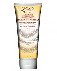 Formulated with fairly-traded Argan Oil and Safflower Oil, our conditioner moisturizes, detangles, and provides intensive smoothing and longlasting shine with a frizz-free finish. Silicone and Paraben-Free Formula. Effectively smooths hair without weighing it down, while preventing frizz and fly-aways. Formula also contains emollient Cocoa Butter to add moisture and shine. Imparts a sleeker, more manageable look and feel to hair. Shampoo with Kiehl's Superbly Smoothing Argan Shampoo. Rinse and apply a generous amount of conditioner to hair, especially the ends. Gently work through the hair and leave on for two to three minutes. Rinse with lukewarm water. Style as usual. Formulated with fairly-traded Argan Oil and Safflower Oil, our conditioner moisturizes, detangles, and provides intensive smoothing and longlasting shine with a frizz-free finish. Silicone and Paraben-Free Formula. Effectively smooths hair without weighing it down, while preventing frizz and fly-aways. Formula also contains emollient Cocoa Butter to add moisture and shine. Imparts a sleeker, more manageable look and feel to hair. Shampoo with Kiehl's Superbly Smoothing Argan Shampoo. Rinse and apply a generous amount of conditioner to hair, especially the ends. Gently work through the hair and leave on for two to three minutes. Rinse with lukewarm water. Style as usual.