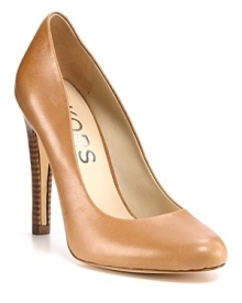 Sleek and shiny, KORS Michael Kors' stacked heel pumps add polish to work wear. Sleek and shiny, KORS Michael Kors' stacked heel pumps add polish to work wear.