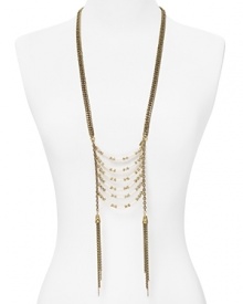 This Vanessa Mooney brass link necklace makes a bold statement with its bone accents and long, tassel trimmed silhouette. Slip it on to take your look from day to darkly glam. This Vanessa Mooney brass link necklace makes a bold statement with its bone accents and long, tassel trimmed silhouette. Slip it on to take your look from day to darkly glam.