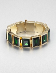 From the Cocktail Collection. Bold faceted stones of rich emerald-colored glass sit all in a row in this striking design of polished goldtone.GlassGoldtoneLength, about 7Width, about .75Bar claspImported From the Cocktail Collection. Bold faceted stones of rich emerald-colored glass sit all in a row in this striking design of polished goldtone.GlassGoldtoneLength, about 7Width, about .75Bar claspImported