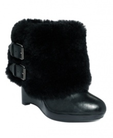 In the battle against winter, fight back with your fiercest fashion. The faux fur cuff and stacked wedge heel of the Arctic booties by Max Studios win every time. In the battle against winter, fight back with your fiercest fashion. The faux fur cuff and stacked wedge heel of the Arctic booties by Max Studios win every time.