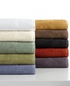 A riveting spectrum of color, the Resort hand towel from Calvin Klein feature fashionable hues set in luxurious Egyptian cotton. Attractive tufted stripes along the hem add subtle dimension. Coordinate with any bath accessories to create an invigorating bathroom retreat.