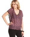 With allover shimmer, this GUESS sheer striped top is a hot layering piece!