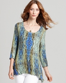 Lined with a seamless lockstitched shapewear tank to slim the figure, this ikat-printed Miraclebody Jeans by Miraclesuit top blends everyday chic with flattering comfort. Lined with a seamless lockstitched shapewear tank to slim the figure, this ikat-printed Miraclebody Jeans by Miraclesuit top blends everyday chic with flattering comfort.
