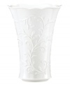 Featuring the embossed vine motif and shiny white glaze of the Opal Innocence Carved collection, this Lenox vase is designed to refine your home indefinitely. With a gently flared silhouette and scalloped edge. A beautiful wedding present! Qualifies for Rebate