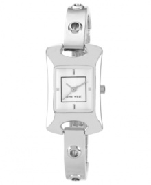Slip on this sleek bangle watch from Nine West to complement your favorite jewelry. Slip on this sleek bangle watch from Nine West to complement your favorite jewelry.