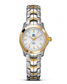 With its unique design, the TAG Heuer Link series has represented a perfect balance of sport and prestige since 1999. Its architecture reflects the power and beauty of steel through the play of contrasts and its refined lines. With white mother-of-pearl dial and a polished 18 Kt. solid gold bezel. Features a date window. With its unique design, the TAG Heuer Link series has represented a perfect balance of sport and prestige since 1999. Its architecture reflects the power and beauty of steel through the play of contrasts and its refined lines. With white mother-of-pearl dial and a polished 18 Kt. solid gold bezel. Features a date window.