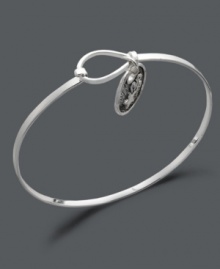 Always aim for the stars. This subtly stylish bangle features an engraved shooting star charm with the words believe in the beauty of your dreams on the flip side. Crafted in sterling silver. Approximate diameter: 2-3/10 inches. Always aim for the stars. This subtly stylish bangle features an engraved shooting star charm with the words believe in the beauty of your dreams on the flip side. Crafted in sterling silver. Approximate diameter: 2-3/10 inches.