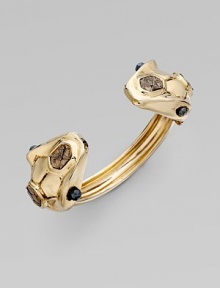 Make a statement with this striking piece with hematite gemstones and snake skin accents. 14K goldplated Slip-on style Diameter, about 2¼ Made in USA Make a statement with this striking piece with hematite gemstones and snake skin accents. 14K goldplated Slip-on style Diameter, about 2¼ Made in USA