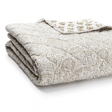 Inspired by old Indian latticework screens, this detailed quilt from JR by John Robshaw reverses to a block floral print in soft clay. Inspired by old Indian latticework screens, this detailed quilt from JR by John Robshaw reverses to a block floral print in soft clay.