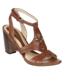 The Naturalizer Merry Sandals add some spring to your step with their dynamic hardware decor, revamped t-strap upper and sculpted wedge heel. The Naturalizer Merry Sandals add some spring to your step with their dynamic hardware decor, revamped t-strap upper and sculpted wedge heel.