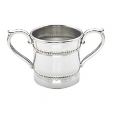 Designed with double bands of beads, this Reed & Barton baby cup has two handles for a child's easy drinking. Crafted in tarnish-resistant pewter, it offers classic good looks. Designed with double bands of beads, this Reed & Barton baby cup has two handles for a child's easy drinking. Crafted in tarnish-resistant pewter, it offers classic good looks.
