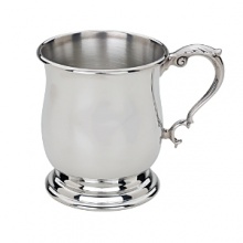 Crafted in the style of popular tankards orginially brought to New England by the British, this beautifully traditional pewter baby cup is finished with a rolled edge. It will be a treasured gift for newborns and their parents for years to come. Crafted in the style of popular tankards orginially brought to New England by the British, this beautifully traditional pewter baby cup is finished with a rolled edge. It will be a treasured gift for newborns and their parents for years to come.